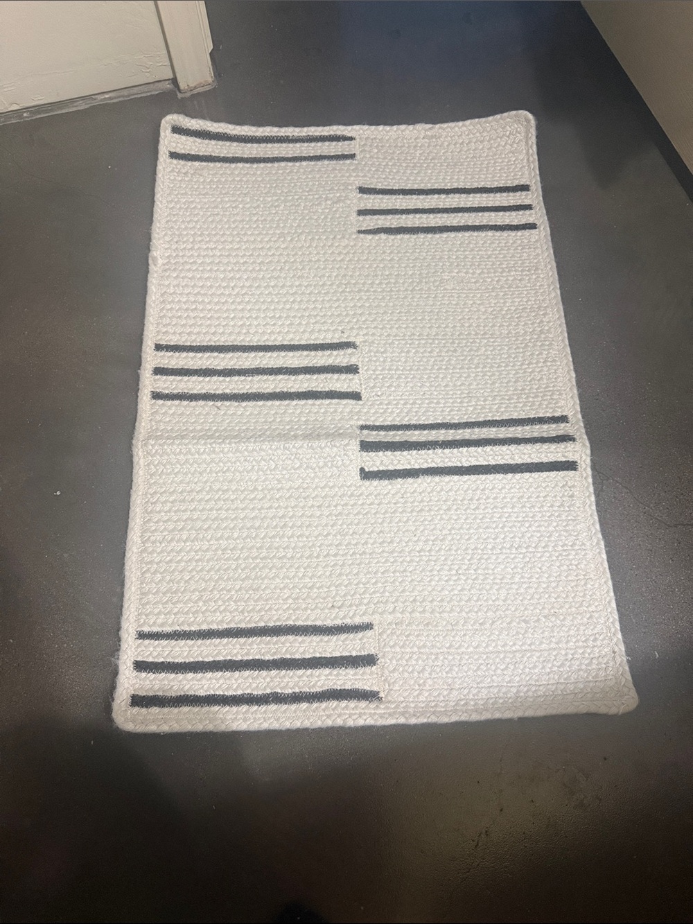 Pottery Barn White Woven Door Mat with Black Stripe Accents